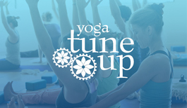 A person practicing yoga tune-up poses, focusing on flexibility and mindfulness in a serene environment.