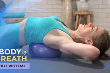 A woman lies on her back with arms raised, surrounded by the phrase "Body by Breath, Roll with Me."
