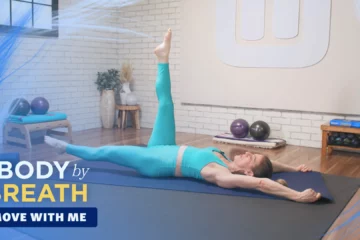 A woman performing a core exercise.