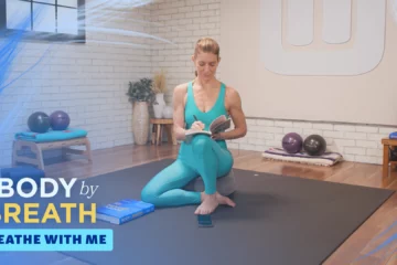 A woman practicing yoga or similar exercise.