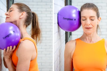 Woman using 'Coregeous' ball for neck exercises.