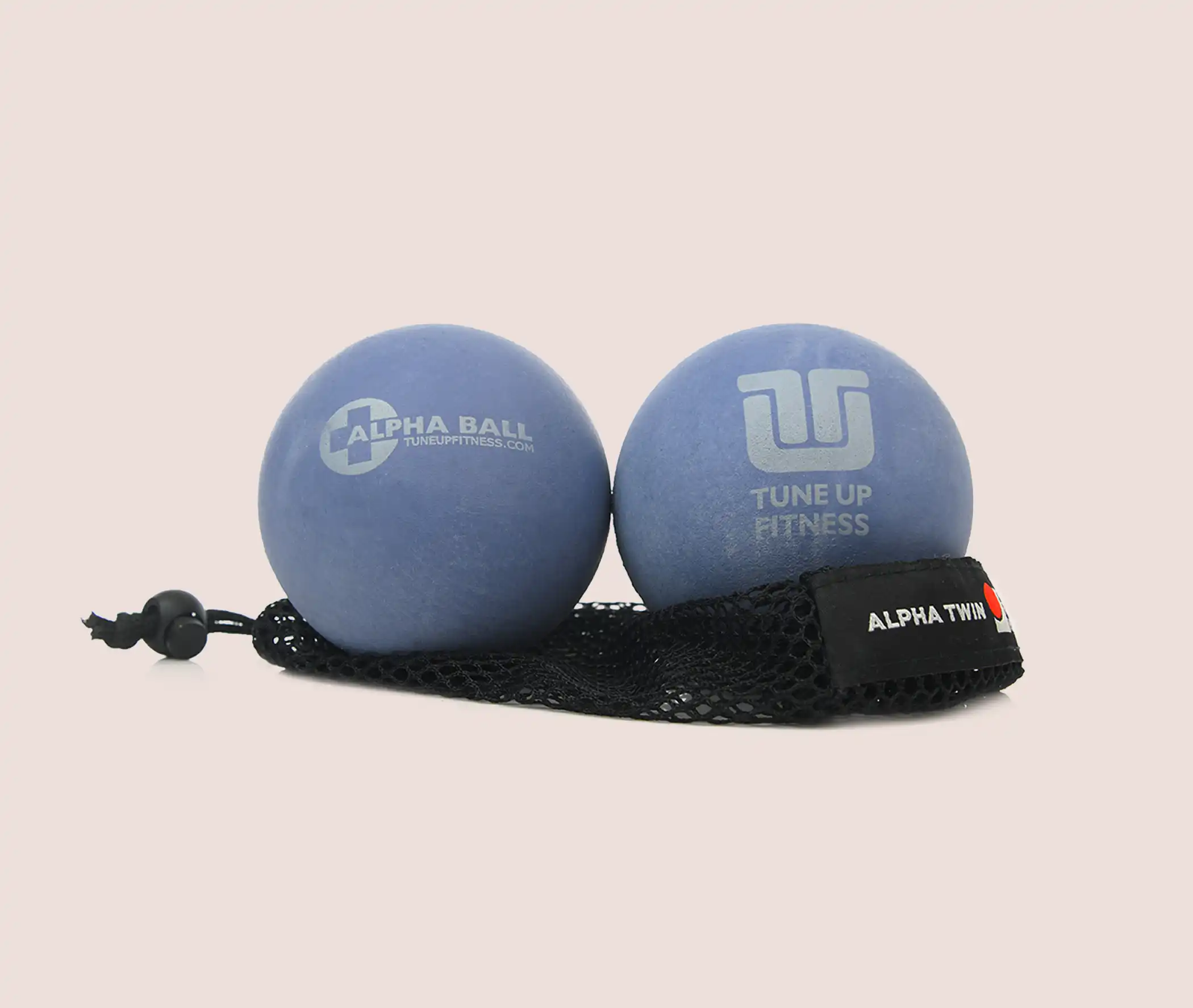 Alpha Twins Tune Up Fitness Alpha Twin therapy ball pair in blue with carry sling, designed for deep self-massage, mobility, and muscle recovery.