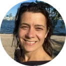 Anuta Bondarenko Smiling customer testimonial headshot for Tune Up Fitness, representing a real user sharing their experience with self-care and wellness tools.