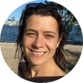 Anuta Bondarenko Smiling customer testimonial headshot for Tune Up Fitness, representing a real user sharing their experience with self-care and wellness tools.