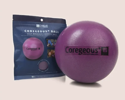 Coregeous Iris Tune Up Fitness Coregeous Ball in iris purple with packaging, designed for core-focused self-massage, breath support, and abdominal release.