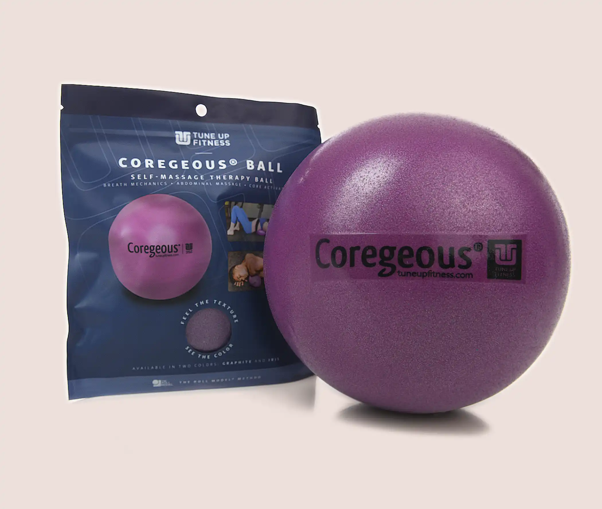 Coregeous Iris Tune Up Fitness Coregeous Ball in iris purple with packaging, designed for core-focused self-massage, breath support, and abdominal release.