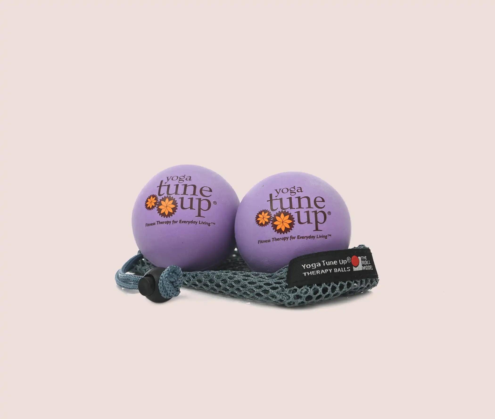 OG Balls Yoga Tune Up therapy ball pair in purple with carry sling, designed for everyday self-massage, mobility, and muscle release.