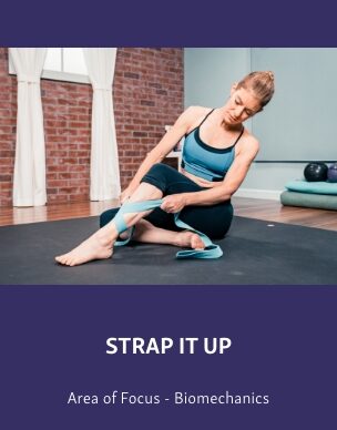 Group-2512 Course graphic showing a woman seated on a mat using a strap around her foot for a mobility exercise, titled “Strap It Up,” with “Area of Focus - Biomechanics” below.
